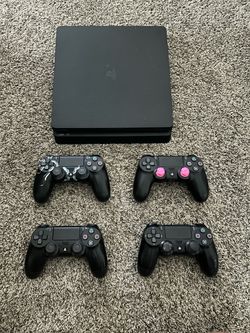 PlayStation 4 Slim Console with 4 Controllers