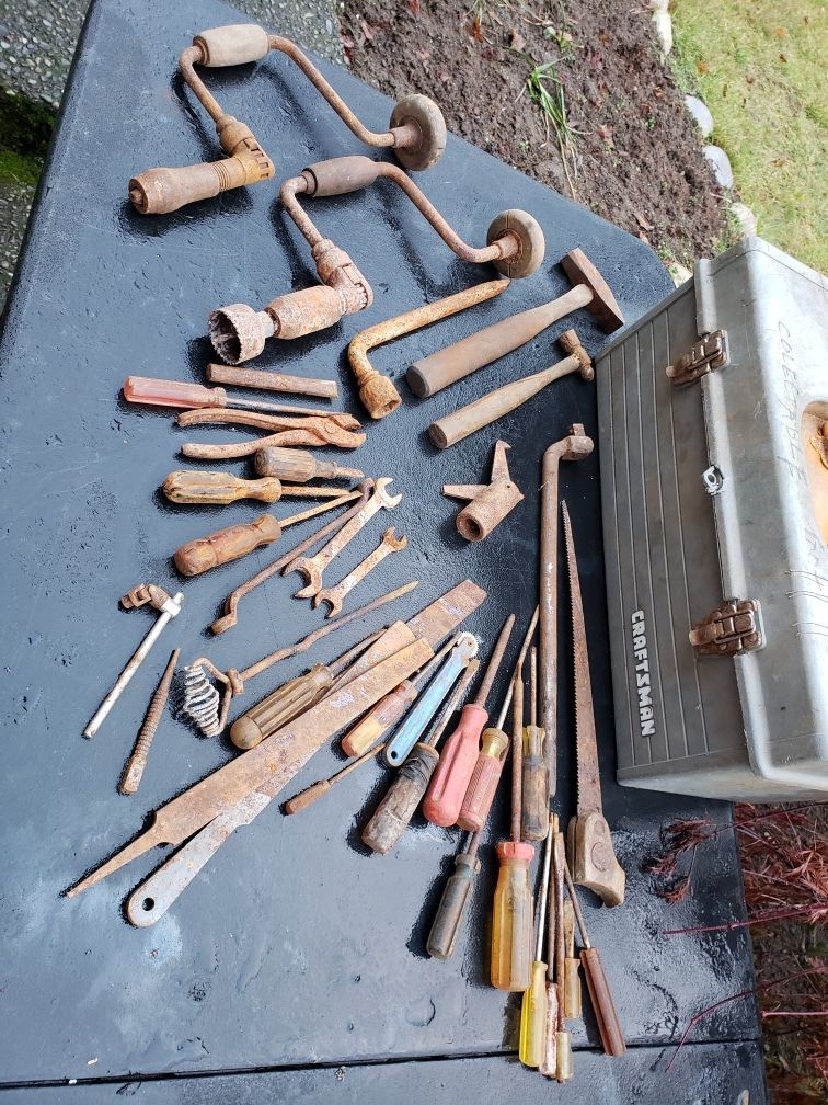 Old rusty tools with Craftsman toolbox