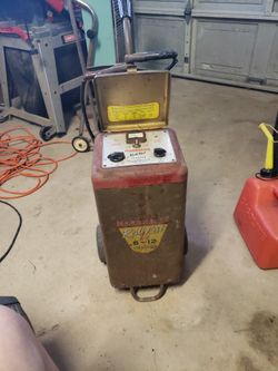 1950s  Marquette Redi-Fast 6-12 Volt Charger