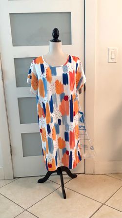 The item is a straight, multicolored dress with an abstract brushstroke print; this particular vibrant print is widely sold in multiple fast-fashion m