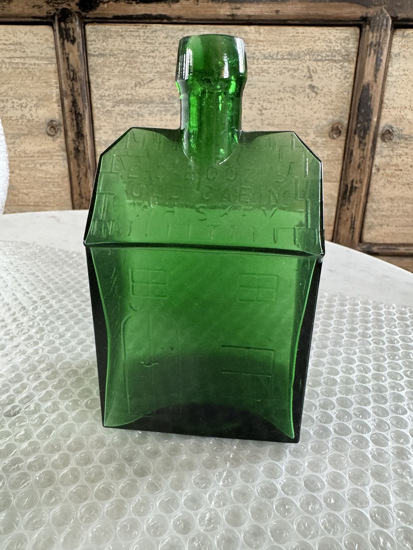 Green Embossed Collectible Bottle