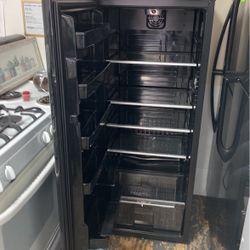 Danby Cooler  Freezer Black.  23”x 59.