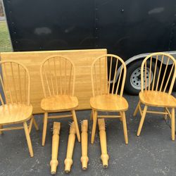 A Nice Solid Kitchen Table And 4 Chairs 