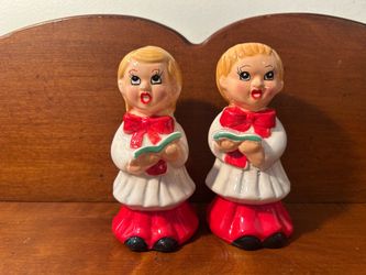 Pair of Carolers Salt & Pepper Shakers about 4 5/8” tall - not in perfect condition, some crazing. See photos