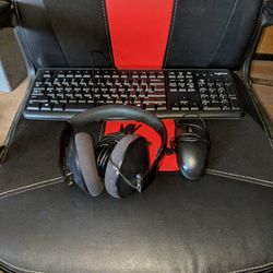 COMPUTER KEYBOARD COMPUTER MOUSE AND A HEADSET