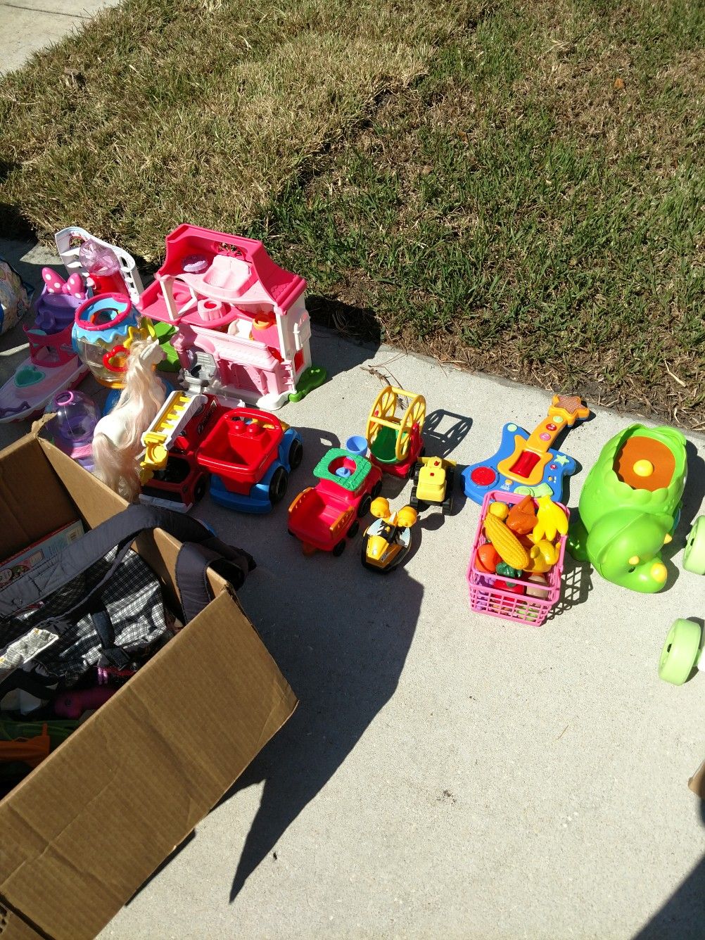 Box of Assorted toys and books