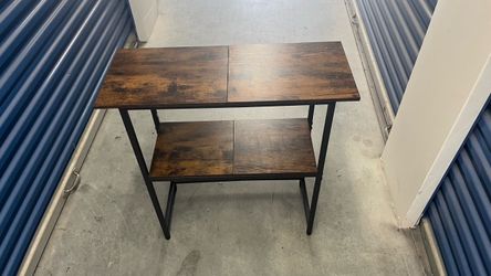 Small table & 2 10ft full size basketball goals