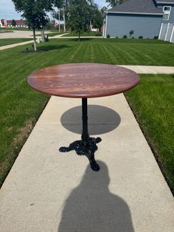 Vintage wood top with cast iron base bistro table great condition