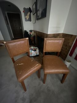 Two Leather Chairs