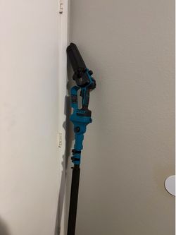 Pole saw new with battery