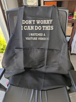 New Apron  with this text in the front of it.  "don't worry I can do this...I watched a you tube video"  New Apron