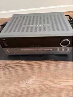 Harman Kardon Stereo, with very high level speakers and very high level connections .