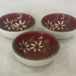 3 World Market white stoneware condiment bowls with red interior and floral design.