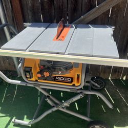 Exclusive RIDGID 15 Amp 10 in. Portable Corded Pro Jobsite Table Saw with Stand No Accessories