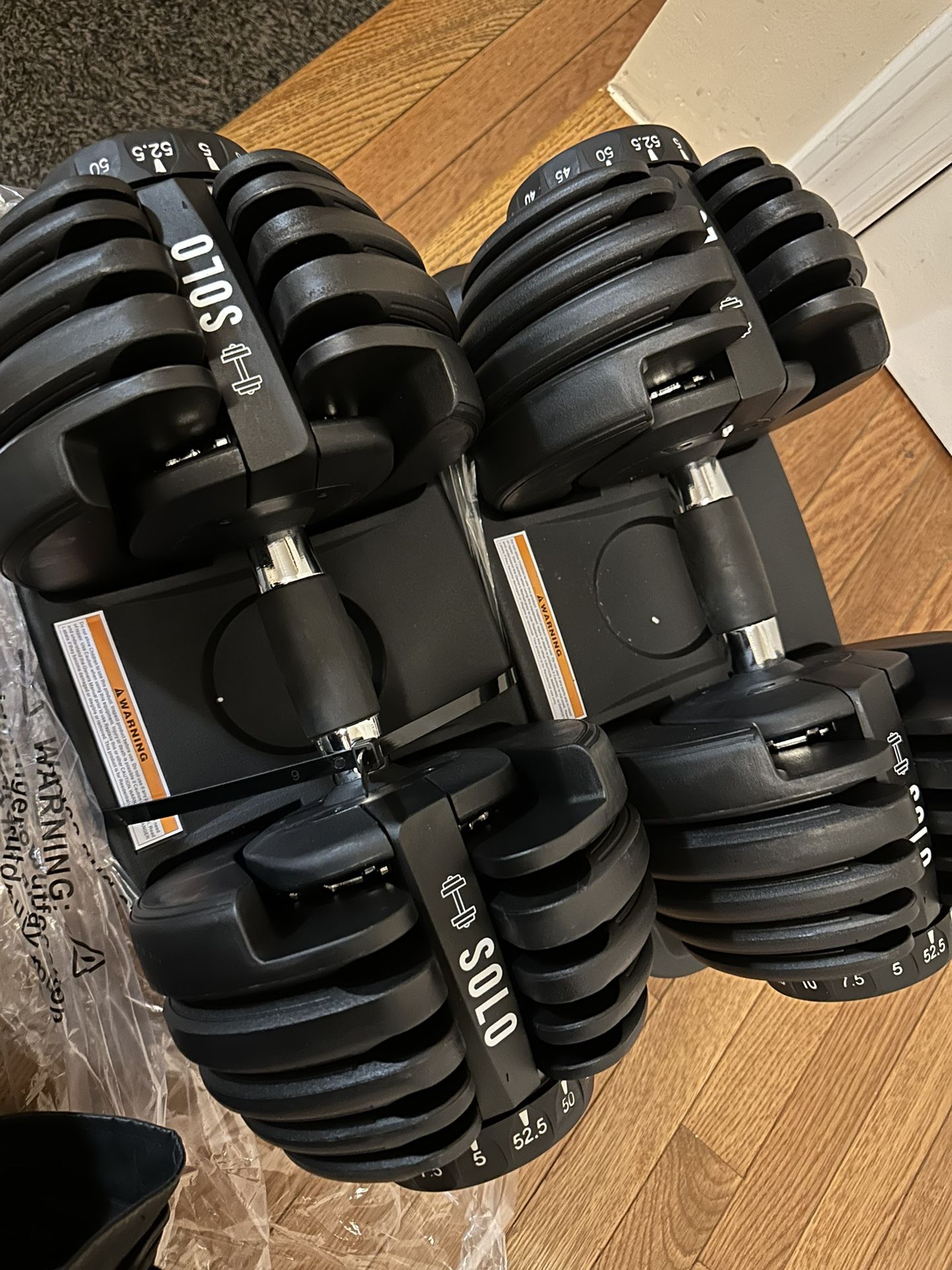 Brand New 52lb adjustable Dumbbells 