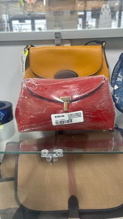 TOTEME T-Lock Mini patent leather clutch