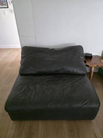 Living Spaces Grey Leather Swivel Loveseat