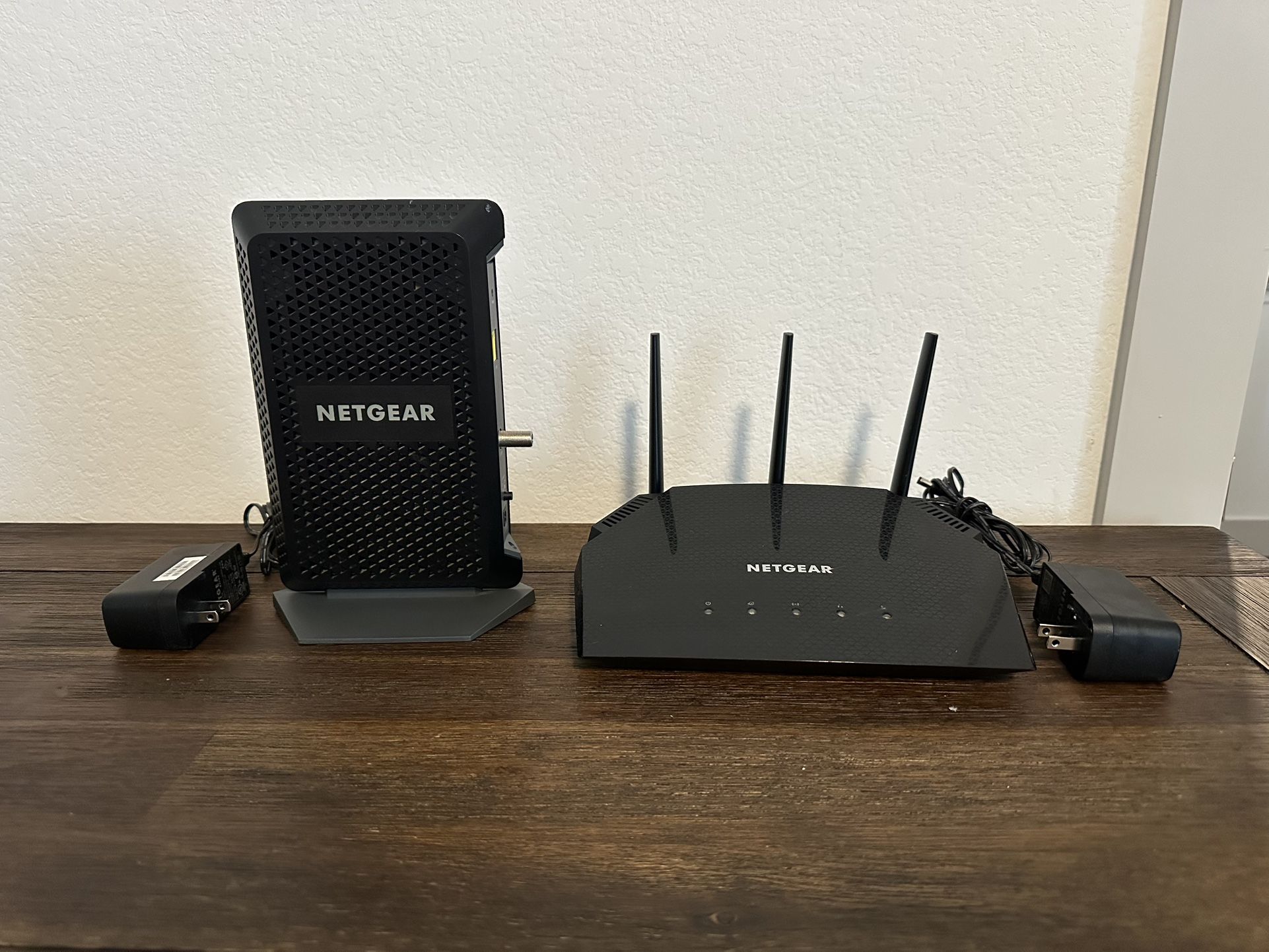 NETGEAR® Night Hawk Cable Modem CM1000v2 NETGEAR* AX1800 WiFi Router Model: RAX10