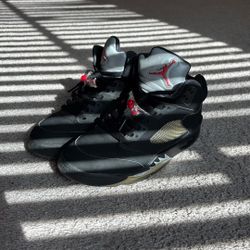 Black metallic jordan 5s