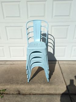 Blue metal stackable chairs