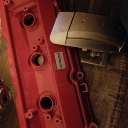 Valve Cover For A Nissan 350Z And Pssenger Door Handle 