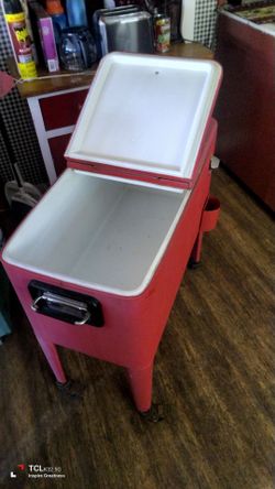 Red ice chest on wheels