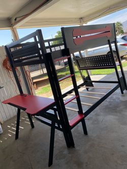 Red and black bunk beds with desk /electric connections New
