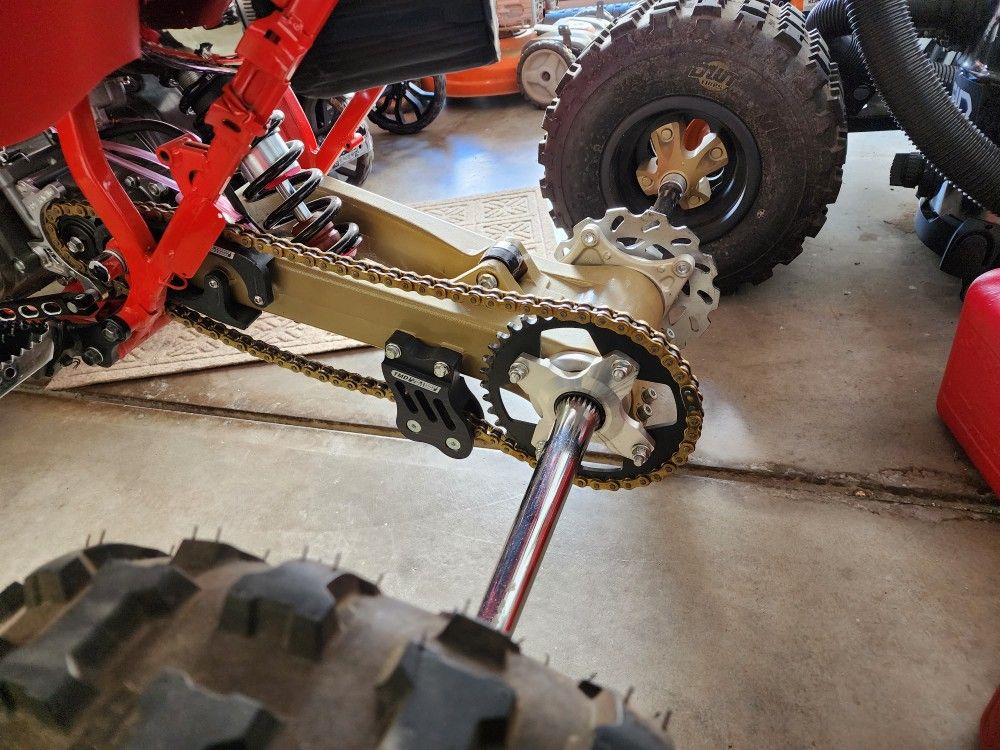 Trx450r Swingarm, Axle, hubs, sprocket, rotor.