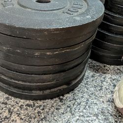 Weights . Plates and bars.  $1 a pond. City of Orange