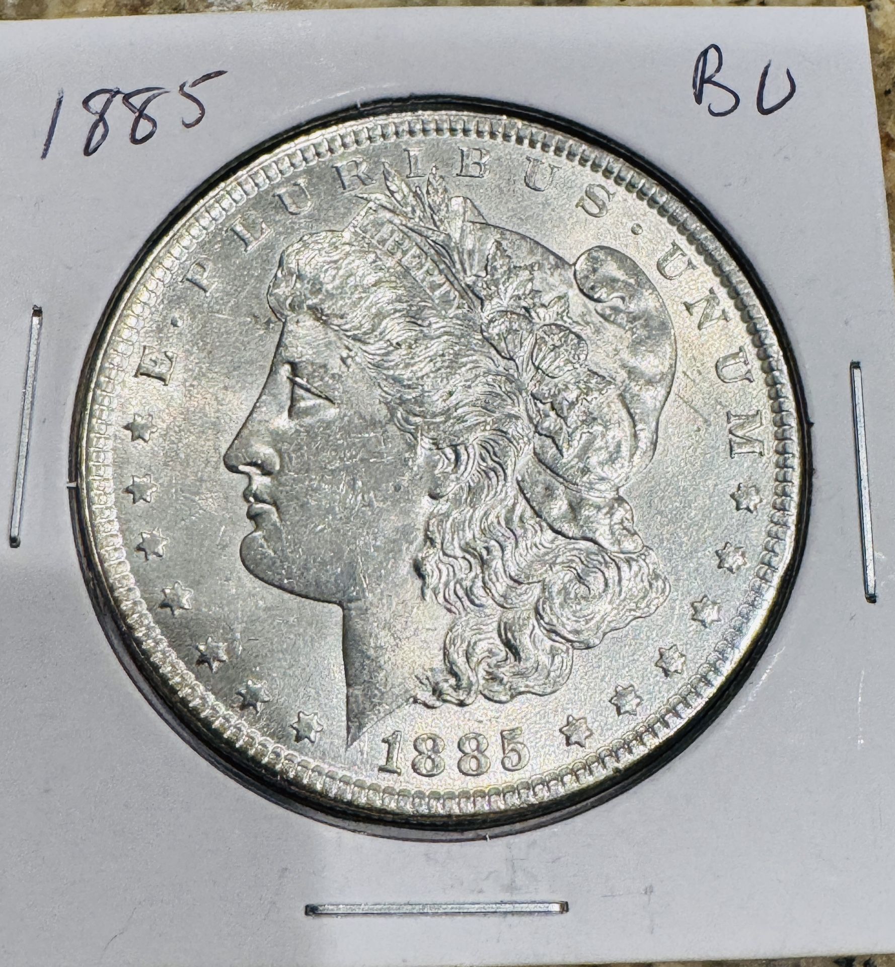 1885 Morgan Silver Dollar In Uncirculated Condition