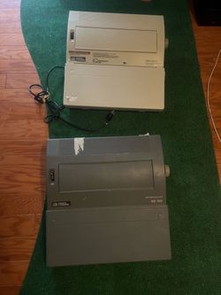 2 Smith and Corona typewriters