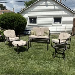 BEAUTIFUL AND COMFORTABLE PATIO SET. IT INCLUDES 1 BENCH,2 RECLINING CHAIRS,1 OTTOMAN AND 2 GLASS TOP TABLES. $250.00 OR BEST OFFER.