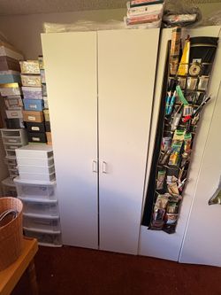 White particle board cabinets