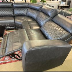 Samperstone Gray 5-Piece Power Reclining Sectional
Ashley Furniture$10 Down Payment And Financing Available