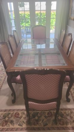 Wood carved Glass Top Dining Table with 8 Chairs