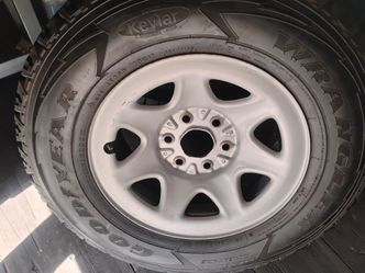 (TWO) Durable Goodyear Wrangler all-terrain tires LT265/70R17