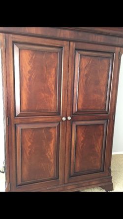 Ethan Allen Armoir solid wood perfect condition adjustable shelves was 3000 now 300 obo We are in Long Beach