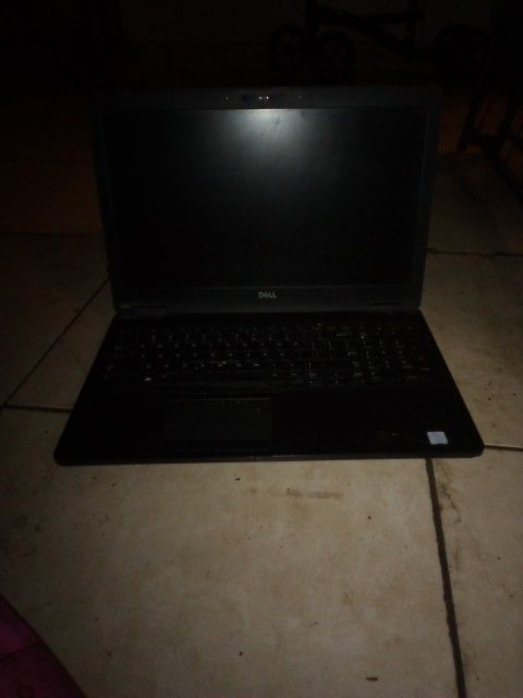 Dell Latitude  Model 5591 With Logic Wireless Mouse