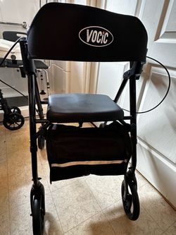 Vocic rolling walker with seat