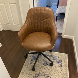 Brown Rolling And Adjustable Office Chair
