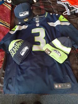 Authentic Russell Wilson on field Jersey and caps sz lg