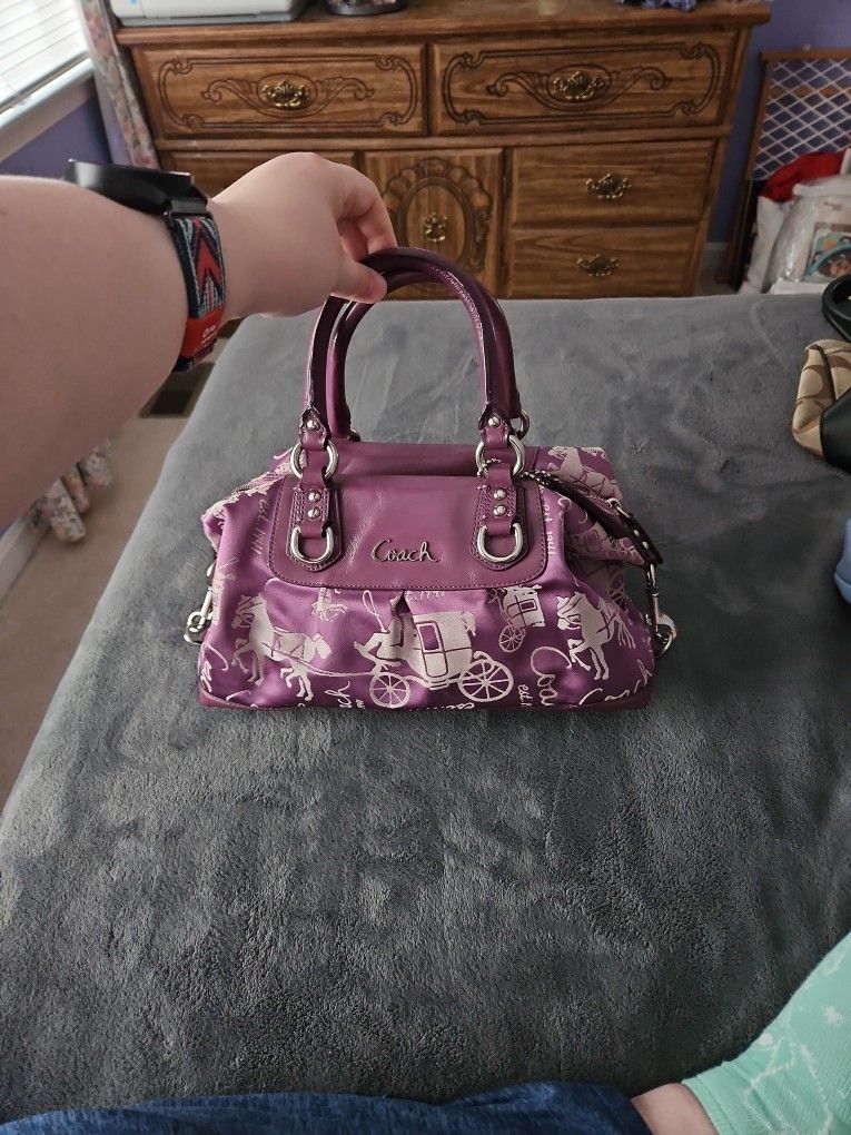 Purple Coach Bag With Signature Stagecoach Desigm