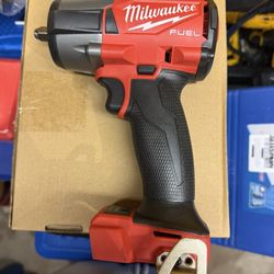 Milwaukee fuel 18v  3/8” impact wrench mid size $180 tool only 