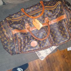 Used designer duffle bags hotsell