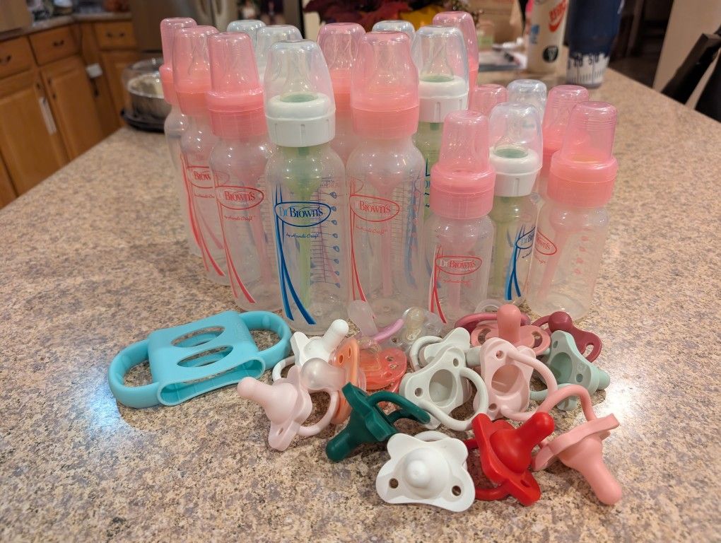 Lot Of Dr. Brown's Bottles And Pacifiers