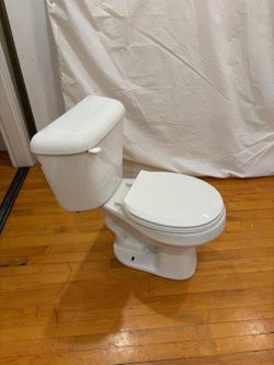 Used chair height toilet