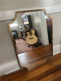 Mirror with gold frame