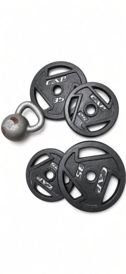 2 weight plates cap 35 lbs and 2 25 pound plus a kettlebell of 35 pound