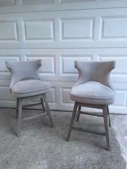Two swivel chairs for $100 both