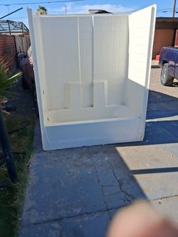 Fiber glass shower tub comes with shower glass doors